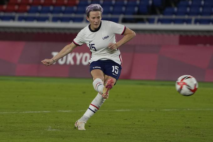 U.S. women's soccer player Megan Rapinoe scores the winning goal against the Netherlands in a penalty shootout during a women's quarterfinal match at the Olympics. &nbsp;(Kiichiro Sato/AP)