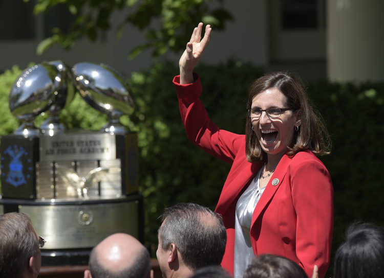 Martha McSally is recognized by Donald Trump during a presentation ceremony of the Commander-in-Chief trophy to the Air Force Academy football team last month in the Rose Garden. (Susan Walsh/AP)</p>  