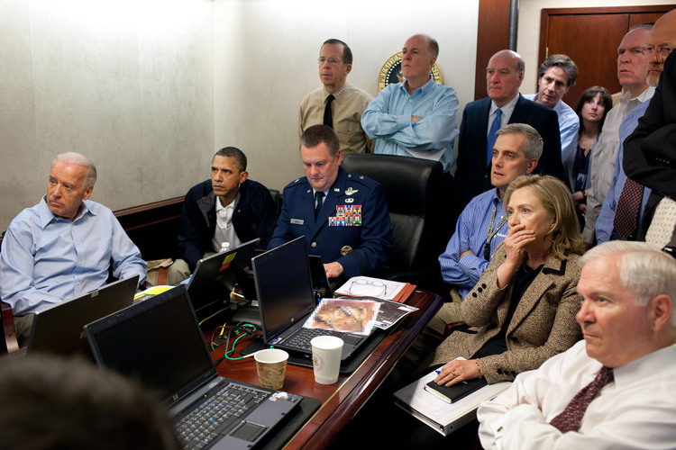 President Barack Obama, Vice President Joe Biden, Secretary of State Hillary Clinton and members of the national security team receive an update on the mission against Osama bin Laden in the Situation Room on May 1, 2011.&nbsp;(Photo by Pete Souza/The White House via Getty Images)</p>  