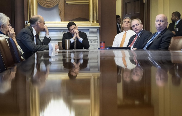 Paul Ryan leads a morning meeting with Kevin McCarthy, Steve Scalise and Kevin Brady last week. (Melina Mara/The Washington Post)</p>  