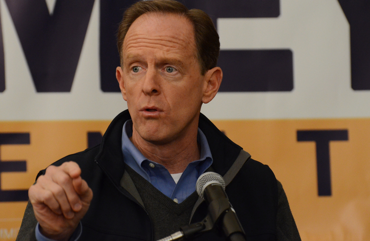 Pennsylvania's Republican Sen. Pat Toomey speaks to a small crowd of GOP loyalists in a Harrisburg hotel yesterday. The contest is the most expensive U.S. Senate race ever, and the outcome of the election may tip control of the chamber next year. (Marc Levy/AP)</p>  
