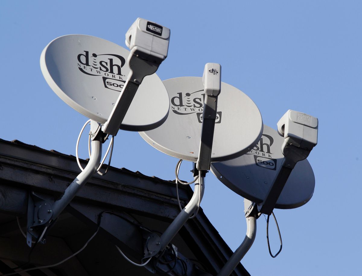 Dish Network satellite dishes at an apartment complex in Palo Alto, Calif. (Paul Sakuma/AP)