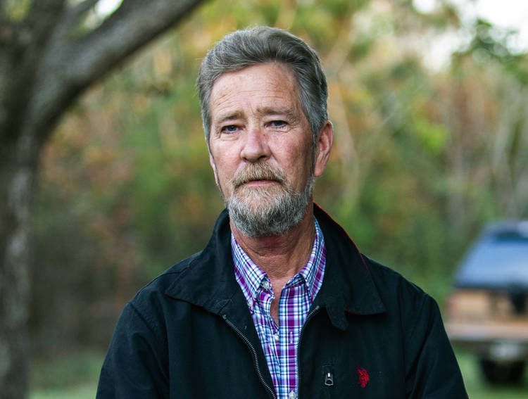 Former political operative Leslie McCrae Dowless poses for a portrait outside his home in Bladenboro, N.C. (Travis Long/Raleigh News & Observer/AP)  