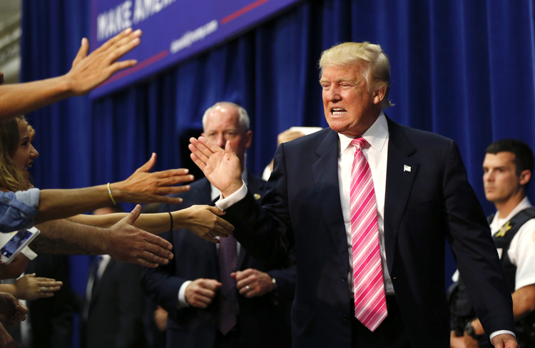 Donald Trump arrives at his Saturday rally&nbsp;in Fredericksburg,&nbsp;Va.&nbsp;(Gerald Herbert/AP)</p>  