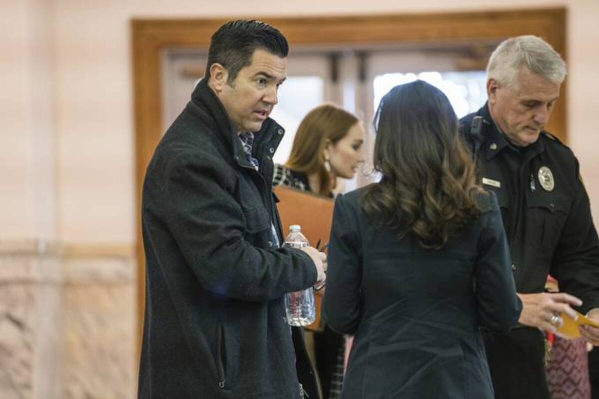 Republican Senate candidate Sean Parnell, left, walks to a courtroom at the Butler County Courthouse for the second day of his child custody trial on Nov. 8 in Butler, Pa. His estranged wife &nbsp;testified he had an affair for nine months during their marriage. (Andrew Rush/Pittsburgh Post-Gazette via AP)