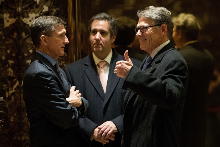 Michael Flynn, Michael Cohen and Rick Perry talk with each other in the lobby at Trump Tower in December. (Drew Angerer/Getty Images)</p>  