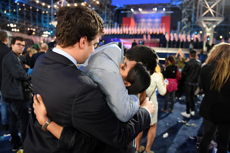 People embrace at Clinton's election night event at the&nbsp;Javits Center in New York. (Jonathan Newton/The Washington Post)</p>  