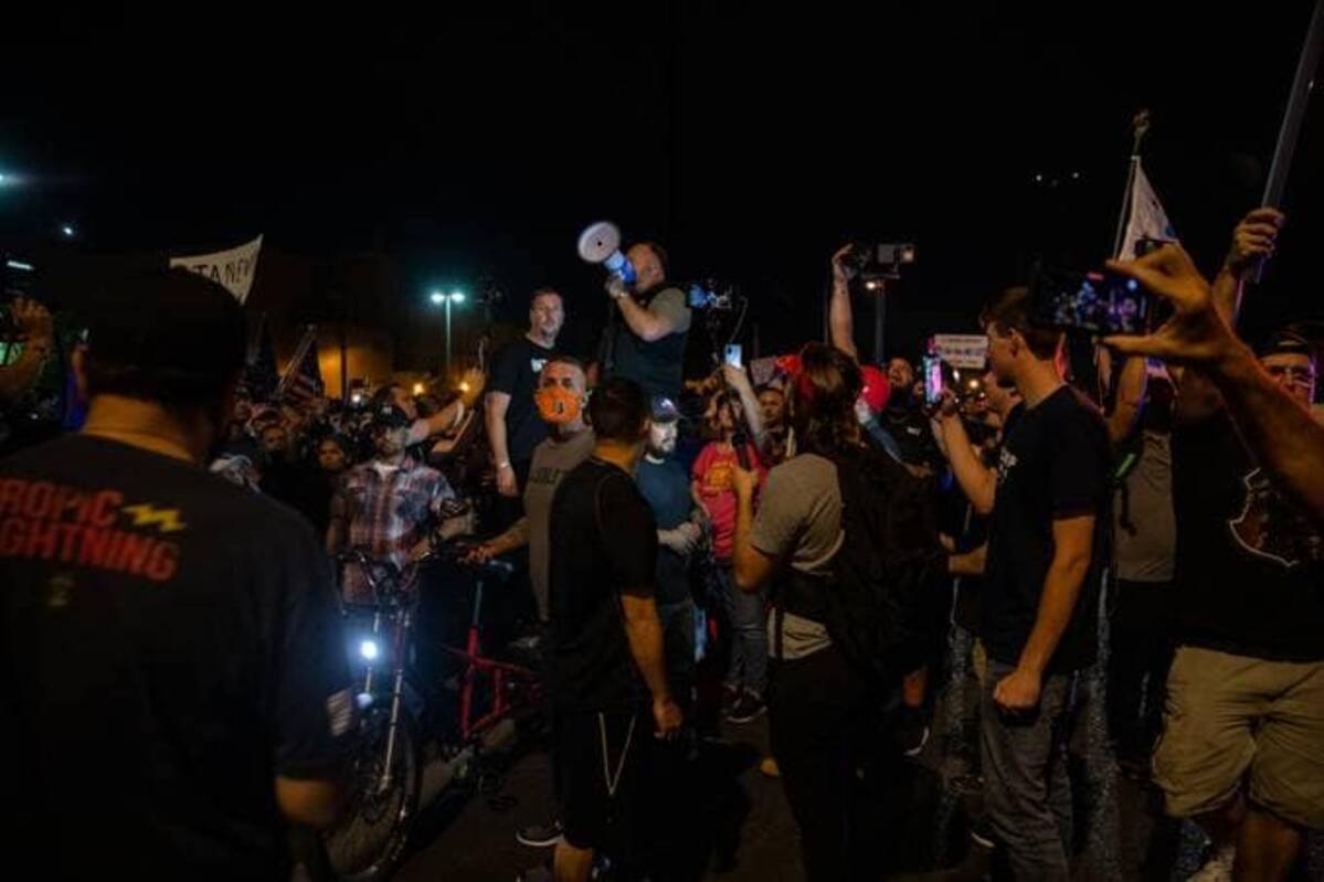 Far-right media personality Alex Jones fires up the pro-Trump protesters at the Maricopa County Tabulation and Election Center in Phoenix on Nov. 5, 2020. (Caitlin O'Hara/The Washington Post)