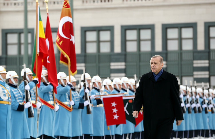 An honor guard greets Turkish President Tayyip Erdogan at his palace in Ankara. (Kayhan Ozer/Presidential Palace/Handout via Reuters)</p>  