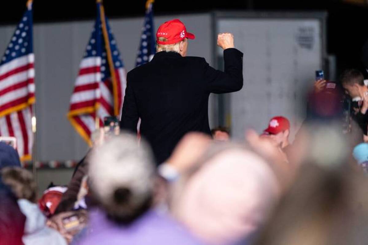Former President Donald Trump gestures after speaking at a 'Save America' rally in Commerce, Ga., on Saturday. (Elijah Nouvelage/Bloomberg News)