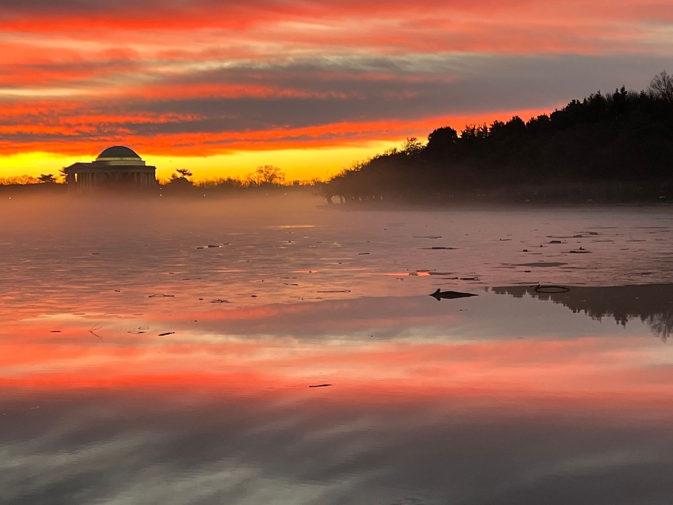 A colorful first dawn of 2023 at the Tidal Basin on Sunday. (Jeannie in D.C./Flickr) (Jeannie in D.C.)