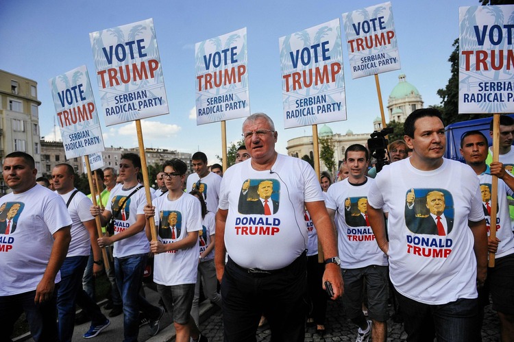 Serbian Radicals wear pro-Trump shirts as they protest Joe Biden. (AFP/Alexa Stankovic)</p>