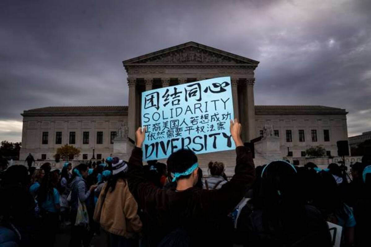 People rally in support of affirmative action in college admissions as arguments start on the cases at the Supreme Court on Capitol Hill on Monday. (Jabin Botsford/The Washington Post)