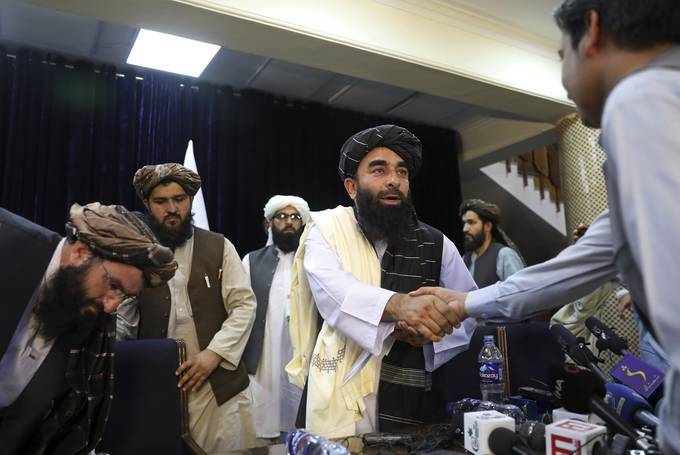 Taliban spokesman Zabiullah Mujahid is active on Twitter. (Rahmat Gul/AP)