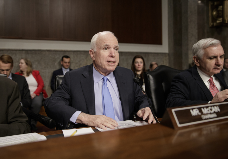 John McCain chairs a hearing of the Senate Armed Services Committee yesterday. (J. Scott Applewhite/AP)</p>