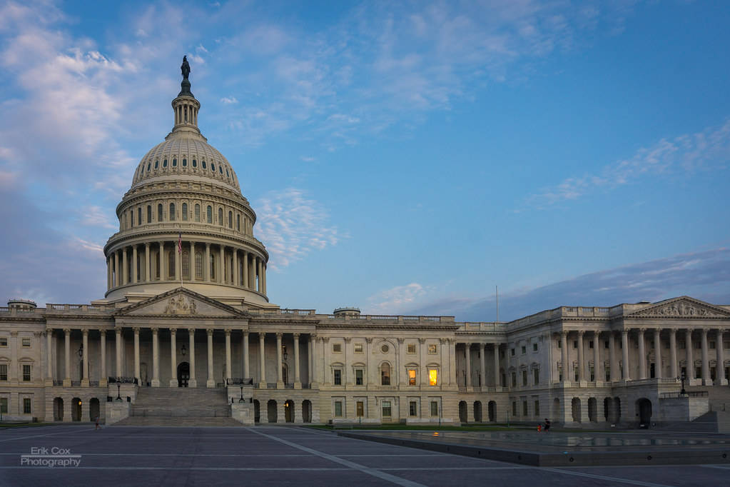 Sunrise reflected in windows of the U.S. Capitol on Friday. (Erik Cox Photography)