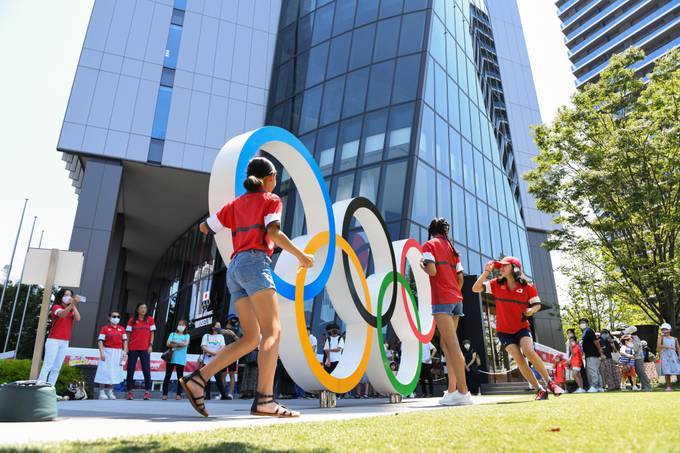 Visitors outside the Japan Olympic Museum in Tokyo. (Noriko Hayashi/Bloomberg News)
