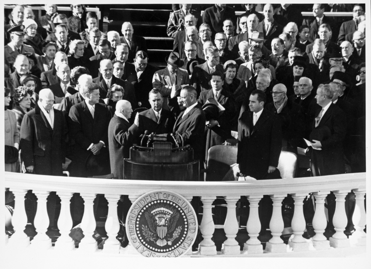 Sam Rayburn swears in Lyndon Johnson as vice president in 1961, as Dwight Eisenhower and John F. Kennedy watch from the left. Outgoing Vice President Richard M. Nixon, who lost that year, is on the right. (US Army)</p>  