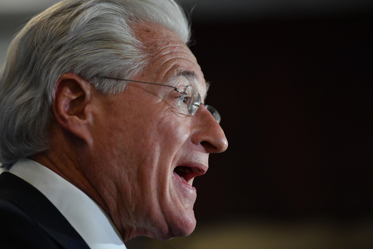 Marc E. Kasowitz, personal attorney for Donald Trump, addresses the media following the testimony of former F.B.I. Director James Comey last month. (Ricky Carioti/The Washington Post)  