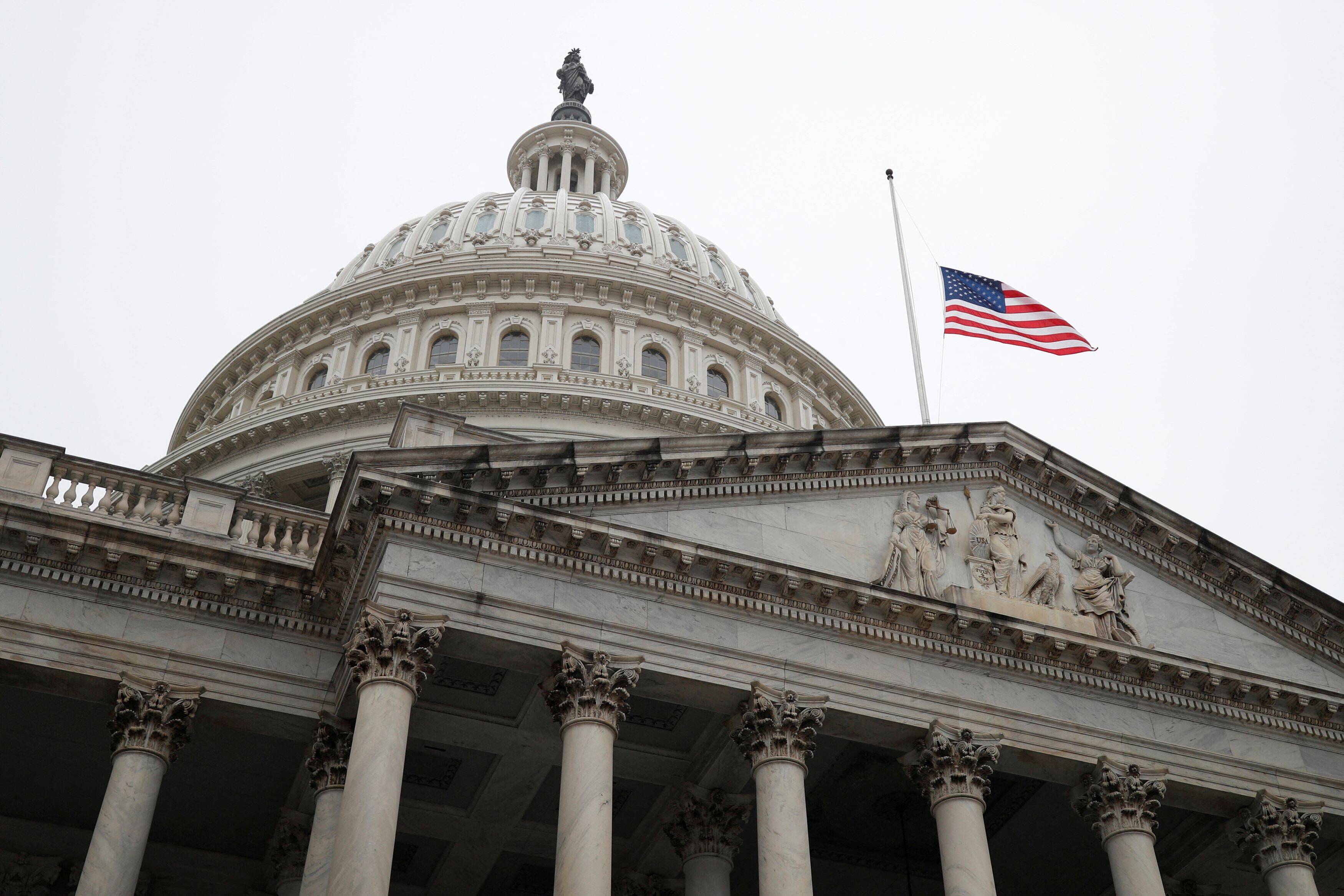 The American flag flies at half-staff in remembrance of Rep. Jim Hagedorn (R-Minn.) at the U.S. Capitol in Washington on Feb. 22. (Tom Brenner/Reuters)