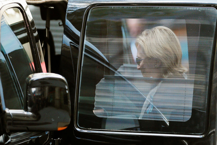 Hillary Clinton climbs into her van outside Chelsea's apartment. (Brian Snyder/Reuters)</p>  