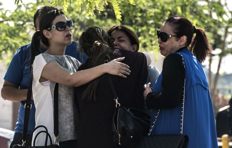 Families of EgyptAir passengers who died wait for news at&nbsp;the&nbsp;Cairo airport. (AFP/Getty Images)</p>  