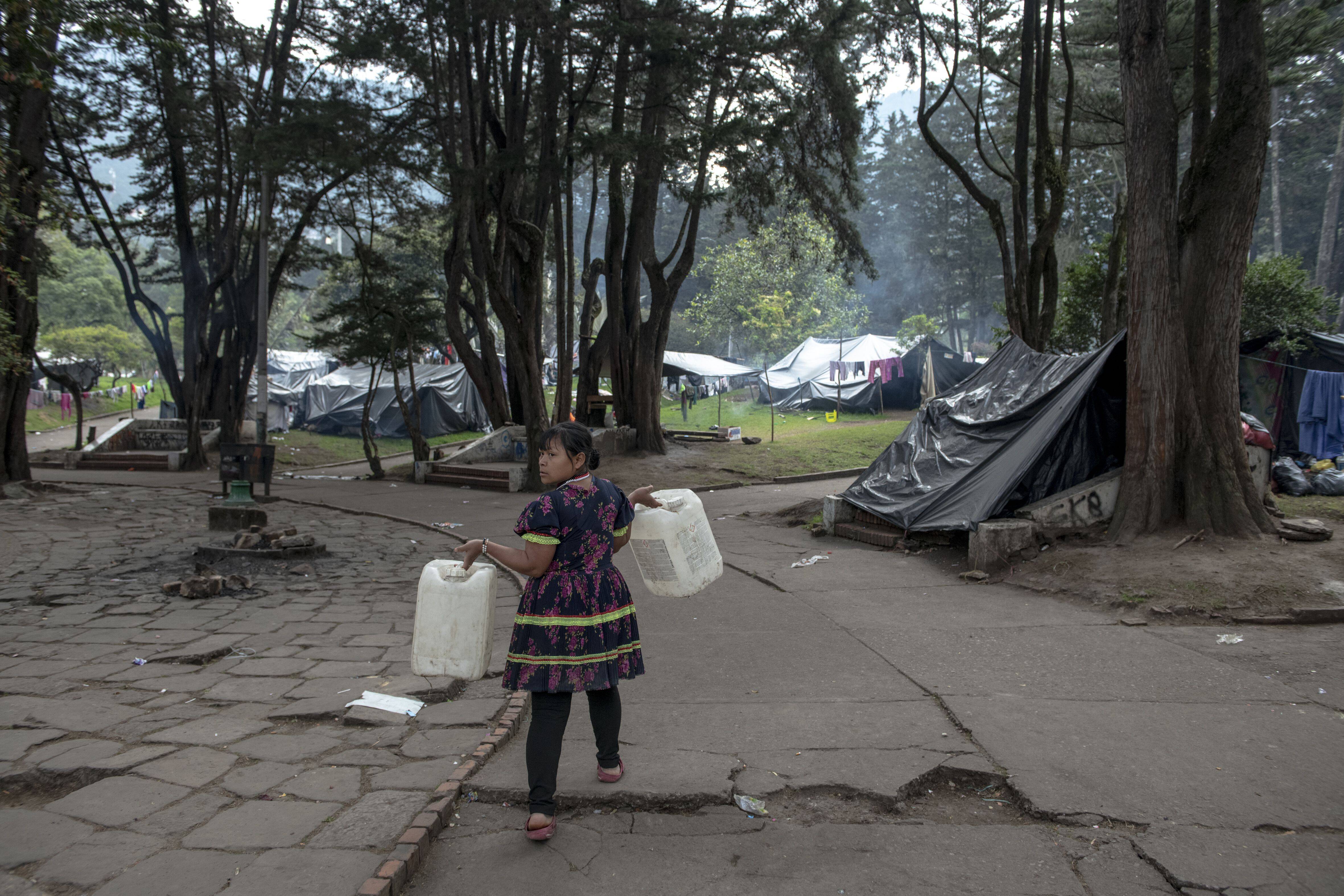Maria Lubia Queracama Tanigama at the protest camp in National Park in Bogotá, Colombia on Dec. 15. (Nadege Mazars for The Washington Post)
