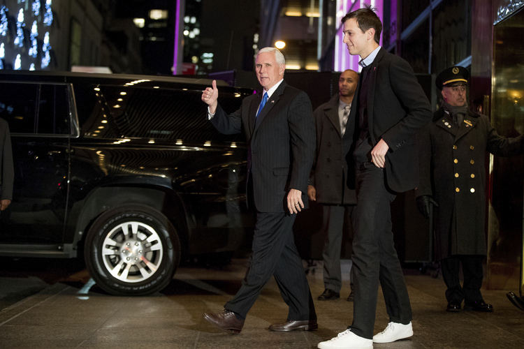 Vice President-elect Mike Pence and Jared Kushner depart from Trump Tower. (Andrew Harnik/AP)</p>  