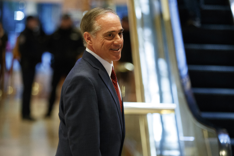 David Shulkin leaves a meeting at Trump Tower on Monday. (Evan Vucci/AP)</p>  