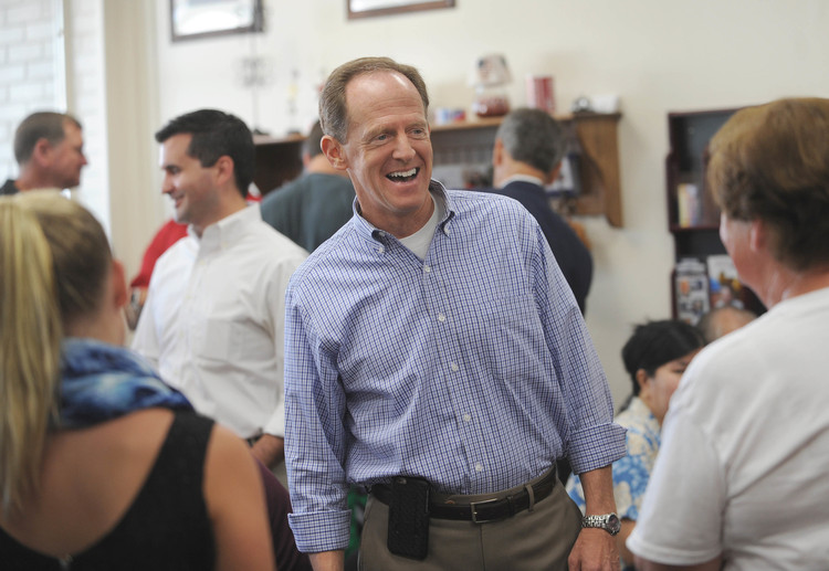Pat Toomey is greeted by supporters at the Cambria County Republican Headquarters in Johnstown, Pa.. (John Rucosky/AP)</p>