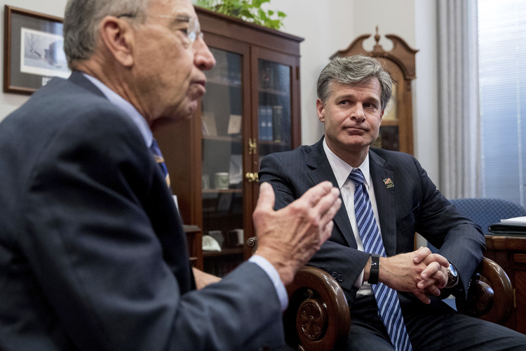 Sen. Chuck Grassley (R-Iowa) meets with FBI Director nominee Christopher Wray on June 29. Grassley will chair his confirmation hearing on Wednesday. (Andrew Harnik/AP)  