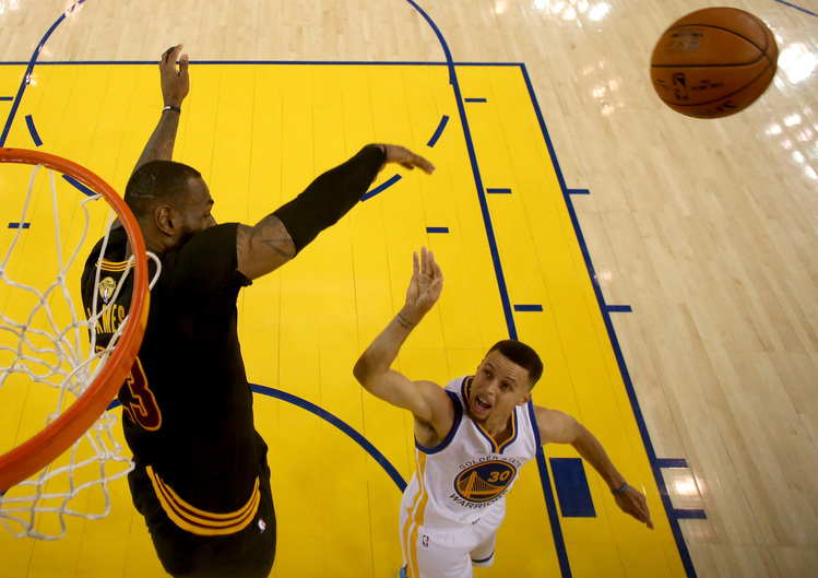 This blocked Steph Curry shot by LeBron James serves as an apt symbol of how firmly he controlled the Cavs&rsquo; Game 5 win in Oakland. (Photo by Ezra Shaw/Getty Images)</p>  