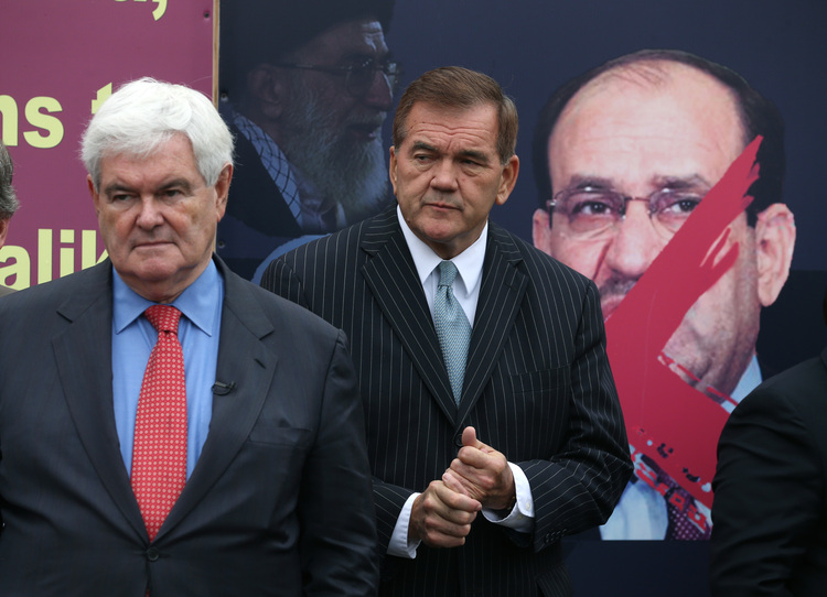 Newt Gingrich and former Secretary of Homeland Security Tom Ridge participate in a protest of the visit of Iraqi Prime Minister Nouri al-Maliki to the White House in 2013.&nbsp;(Photo by Mark Wilson/Getty Images)</p>  