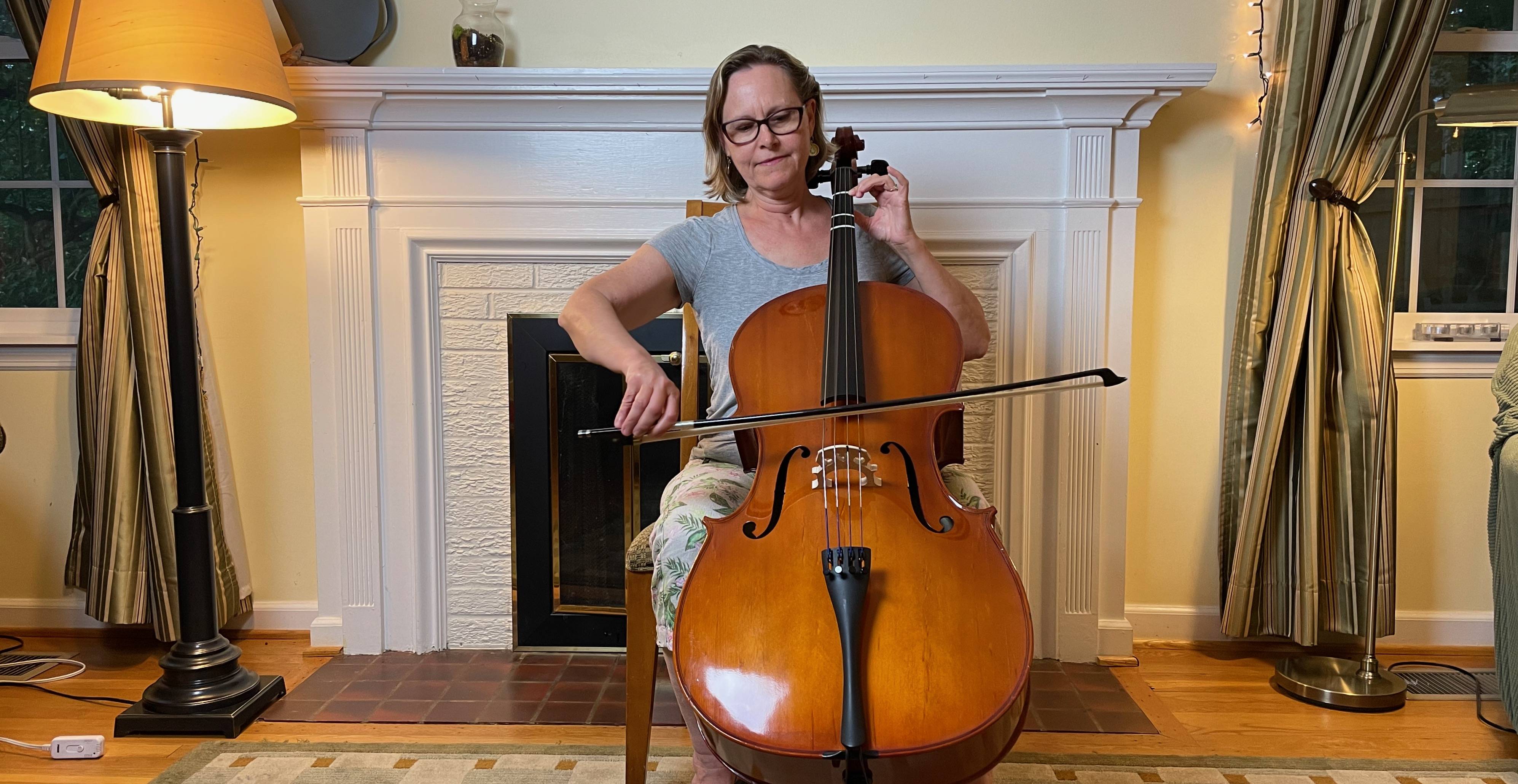 Dawn Charles and her summer-vacation cello. (Ron Charles/The Washington Post)