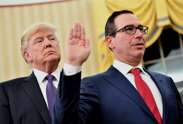 Steven Mnuchin recites the oath of office during a swearing-in ceremony inside the Oval Office last night. (Kevin Dietsch/Pool via Bloomberg)</p>