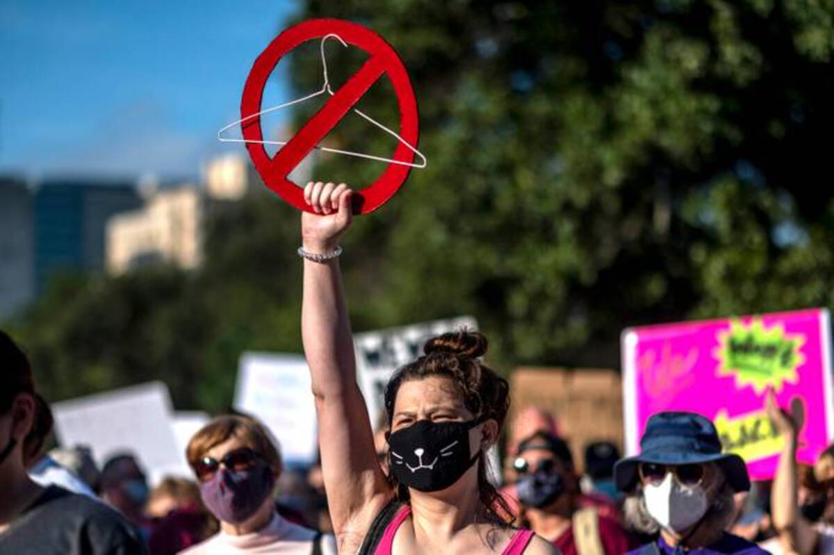 Protestors in Austin, Texas. (Photo by SERGIO FLORES/AFP via Getty Images)