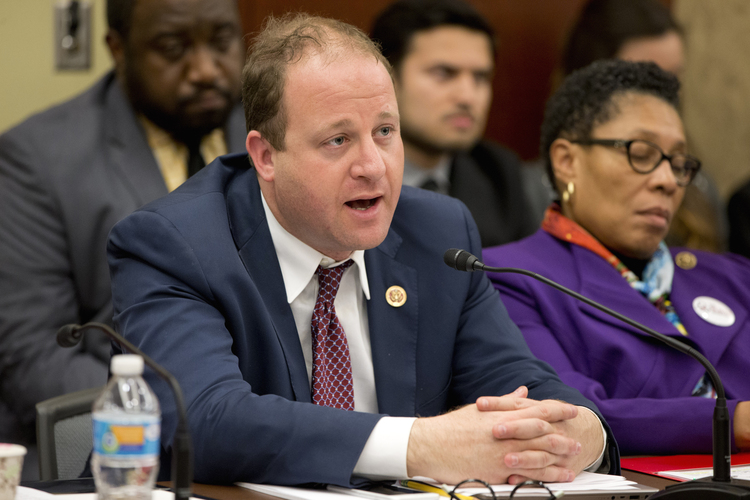 Jared Polis speaks on the Hill. (Jacquelyn Martin/AP)</p>  