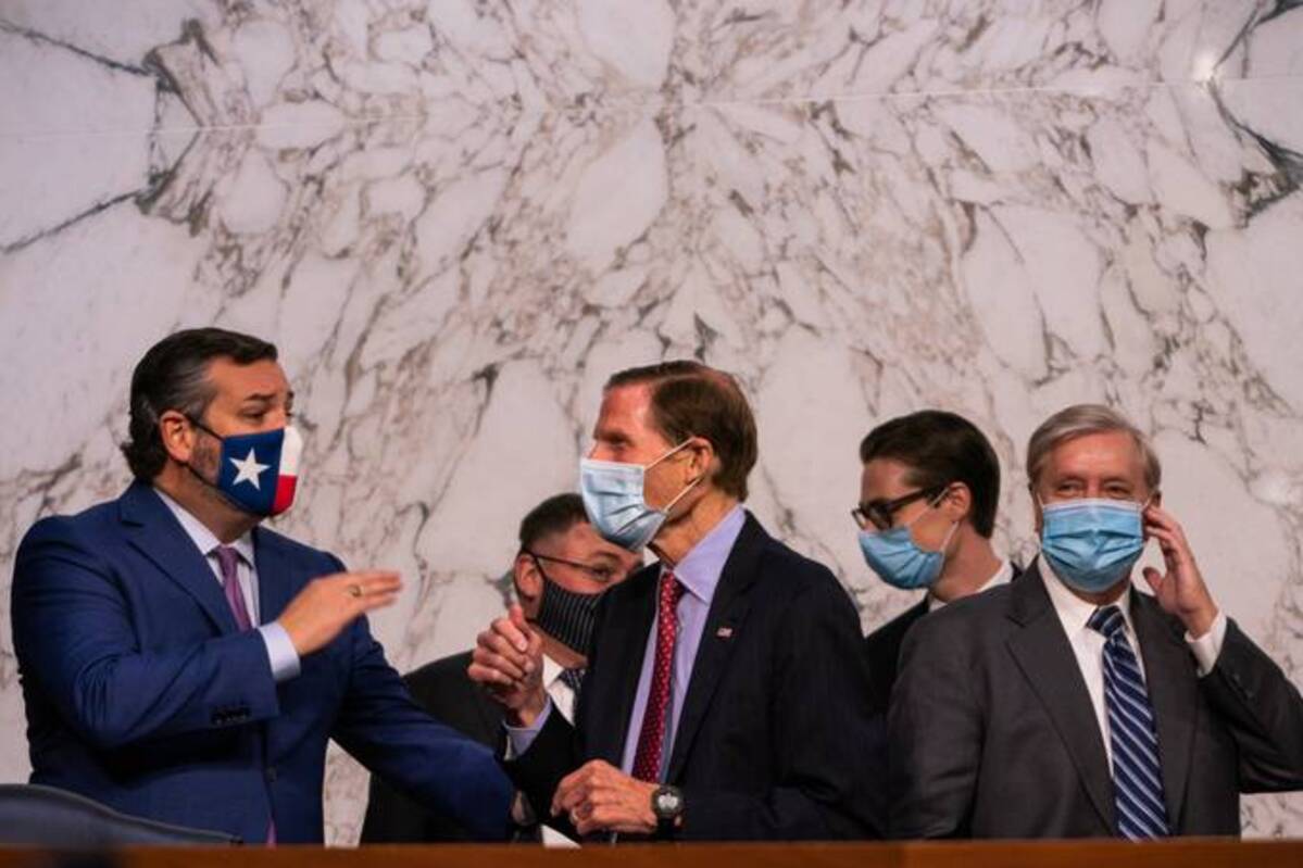 Sens. Richard Blumenthal (D-Conn.), center, and Lindsey Graham (R-S.C.), right, are main sponsors of the EARN IT Act. (Demetrius Freeman/The Washington Post)