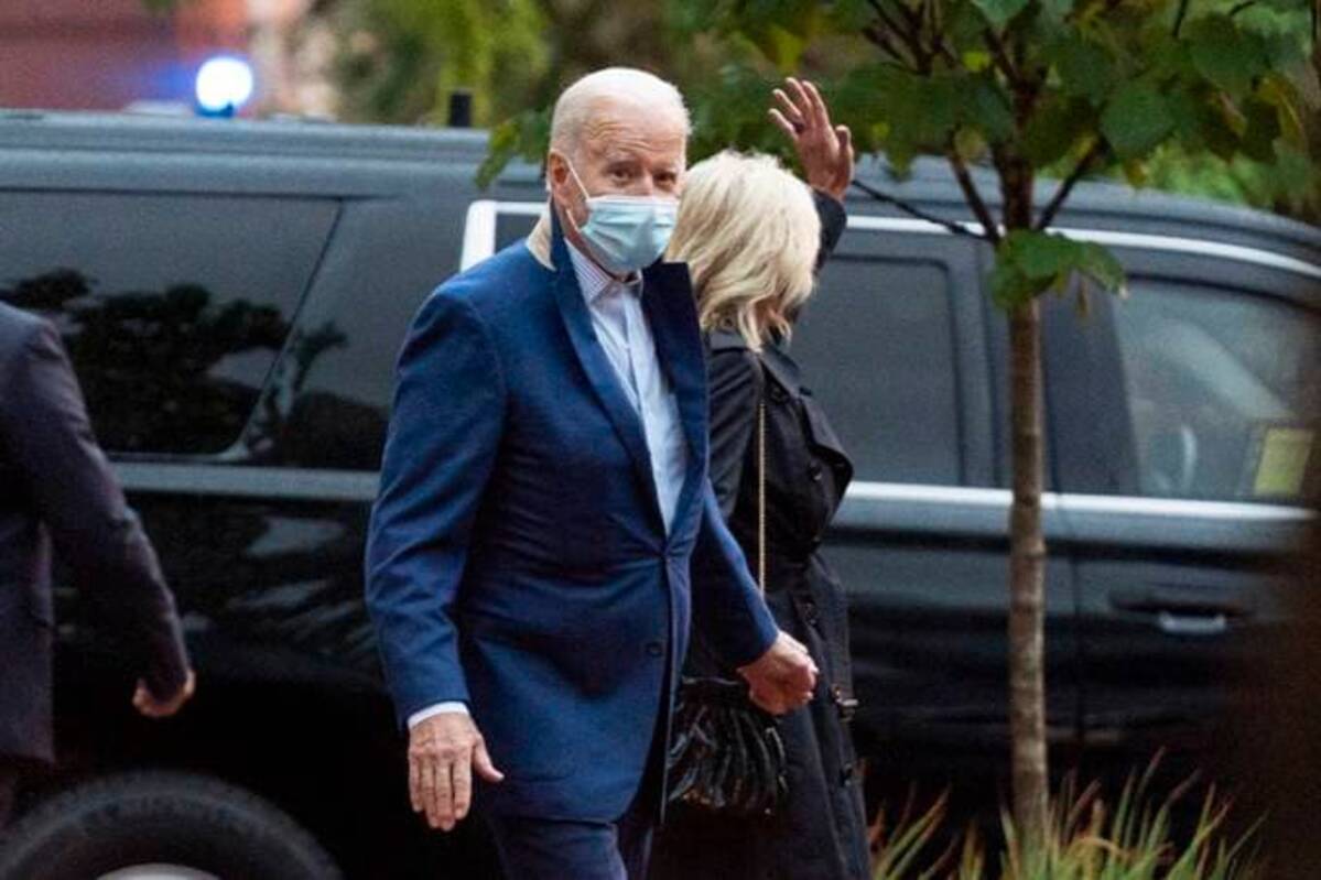 President Biden and first lady Jill Biden leave Holy Trinity Catholic Church in the Georgetown section of Washington, after attending a Mass, Saturday, Oct. 16, 2021. (AP Photo/Manuel Balce Ceneta)
