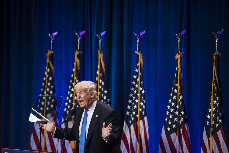 Trump speaks at Saint Anselm College in&nbsp;New Hampshire. (Jabin Botsford/The Washington Post)</p>  