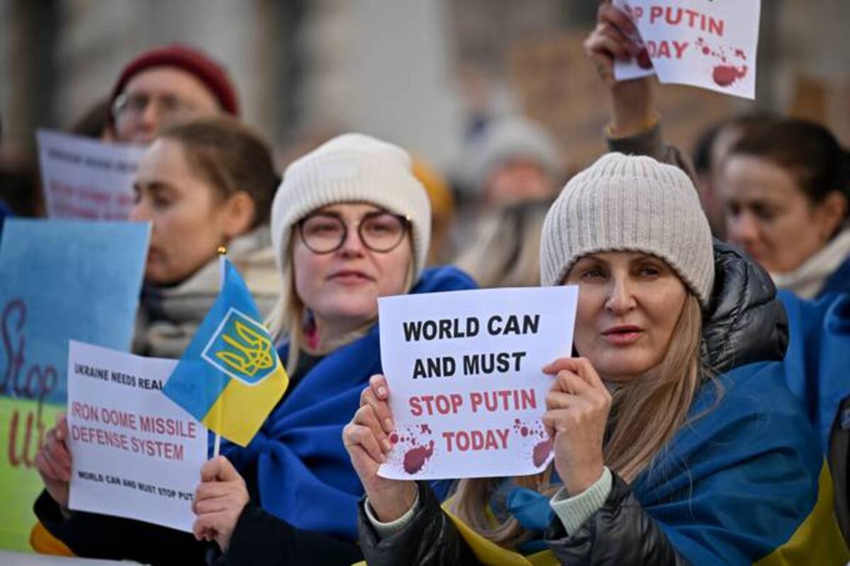 Ukrainians demonstrate outside Downing Street against the recent invasion of Ukraine on Thursday in London. (Jeff J Mitchell/Getty Images)
