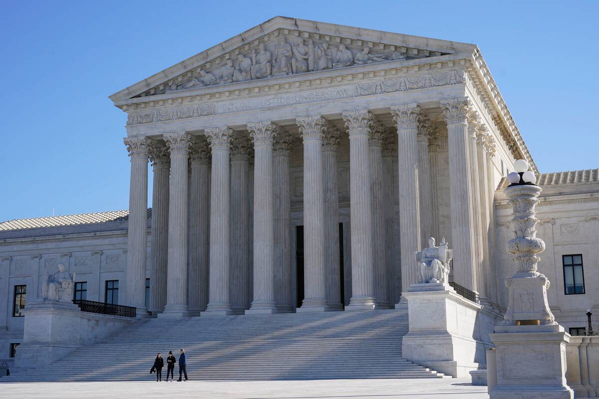 Visitors outside the Supreme Court on Feb. 21. (Patrick Semansky/AP)