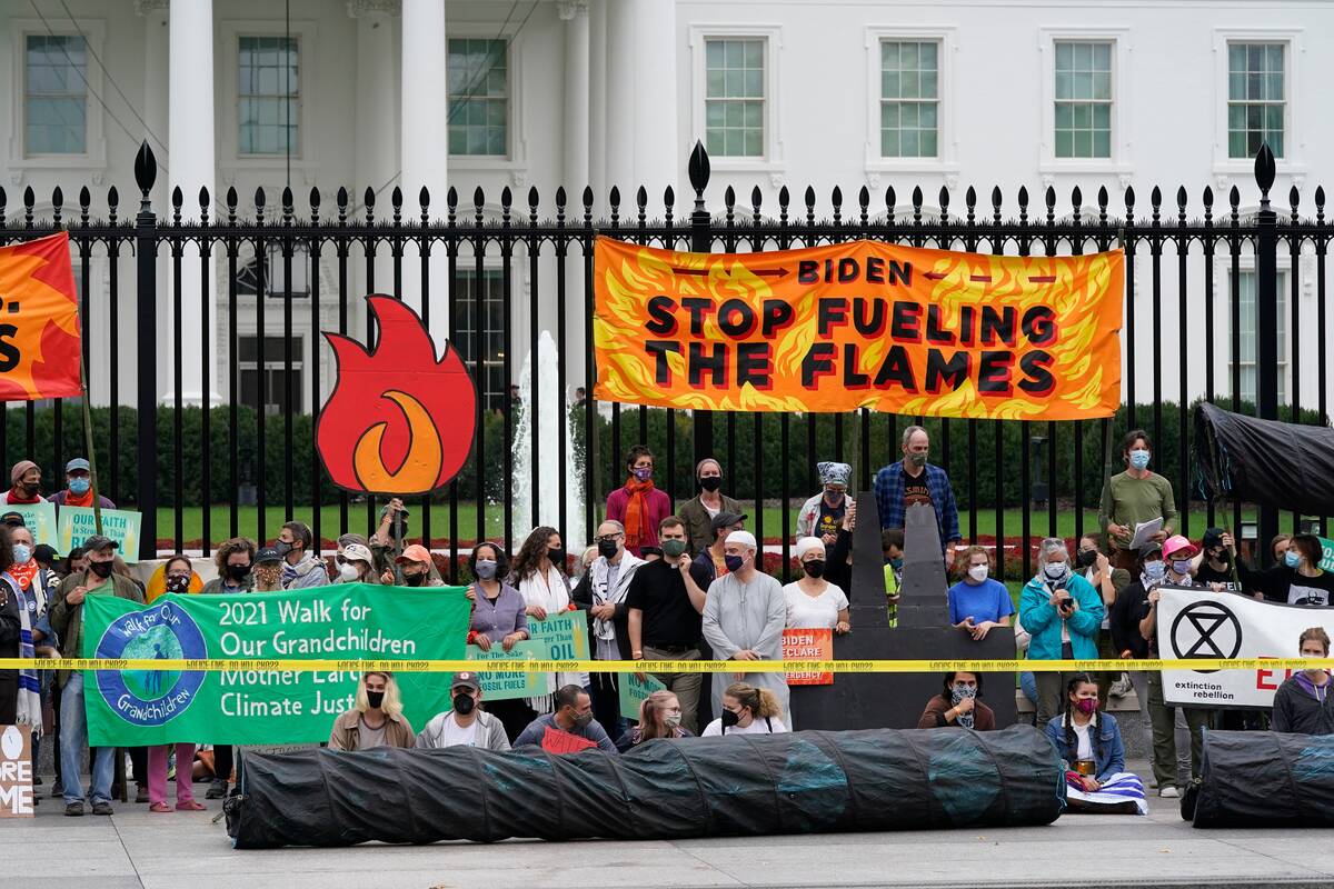 Demonstrators assemble near the White House on Oct. 12. (Patrick Semansky/AP)