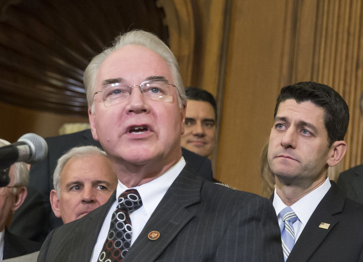Tom Price speaks with Paul Ryan last Thursday. (J. Scott Applewhite/AP)</p>  