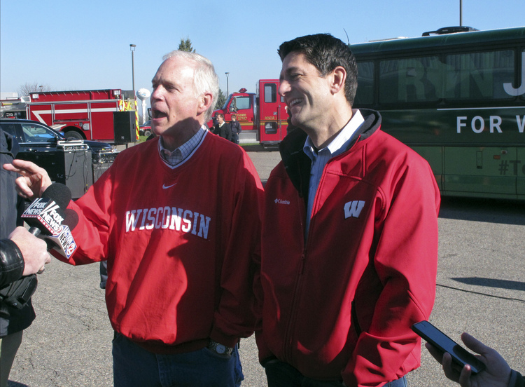 Paul Ryan and Sen. Ron Johnson gaggle yesterday in Mosinee, Wis. (Scott Bauer/AP)</p>  