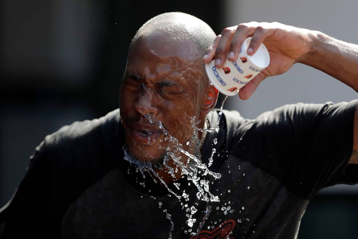 Baltimore Orioles outfielder Keon Broxton during a heat wave in 2019. (Julio Cortez/AP)