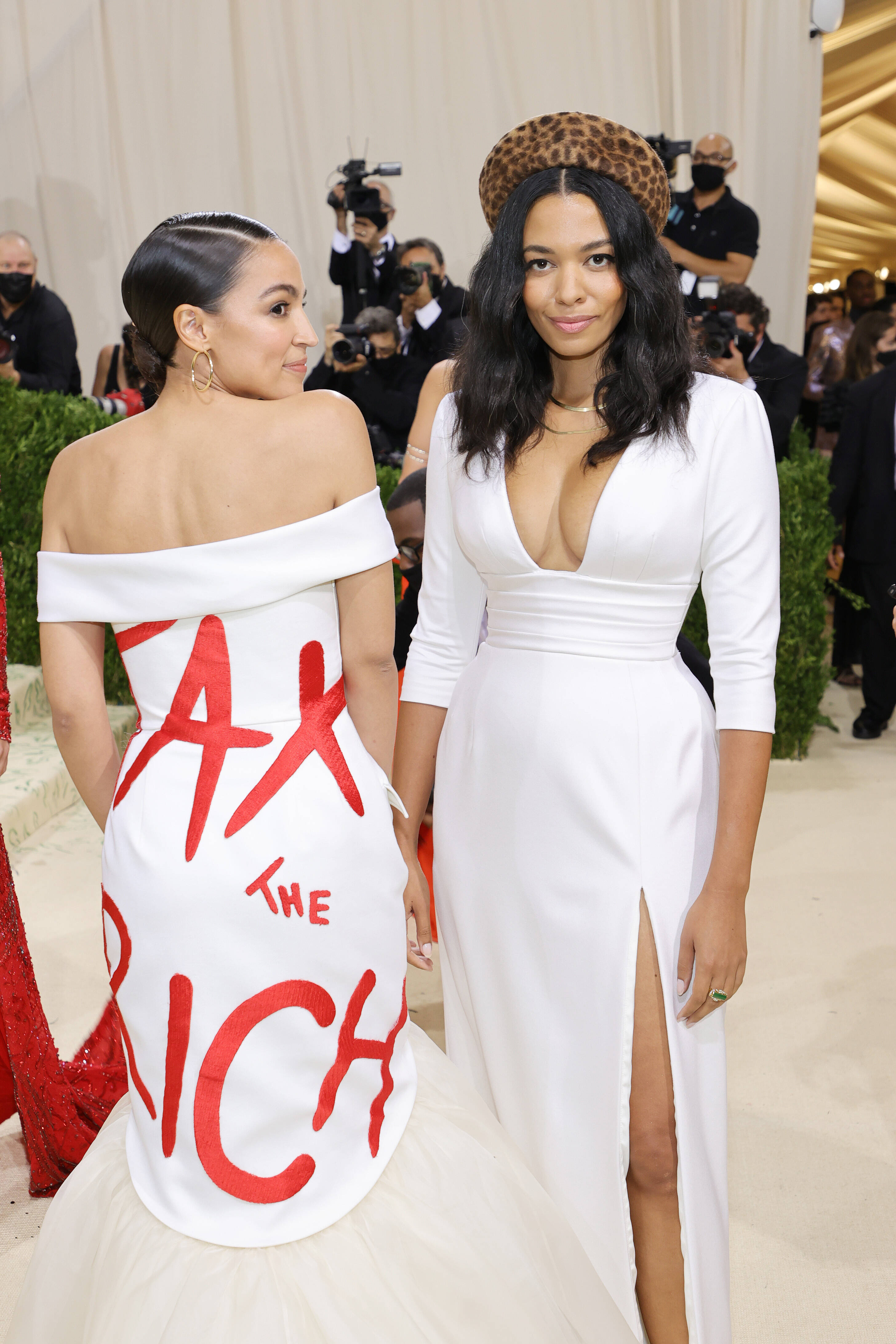 Rep. Alexandria Ocasio-Cortez (D-N.Y.), left, and fashion designer Aurora James at the Met Gala on Sept. 13 in New York.