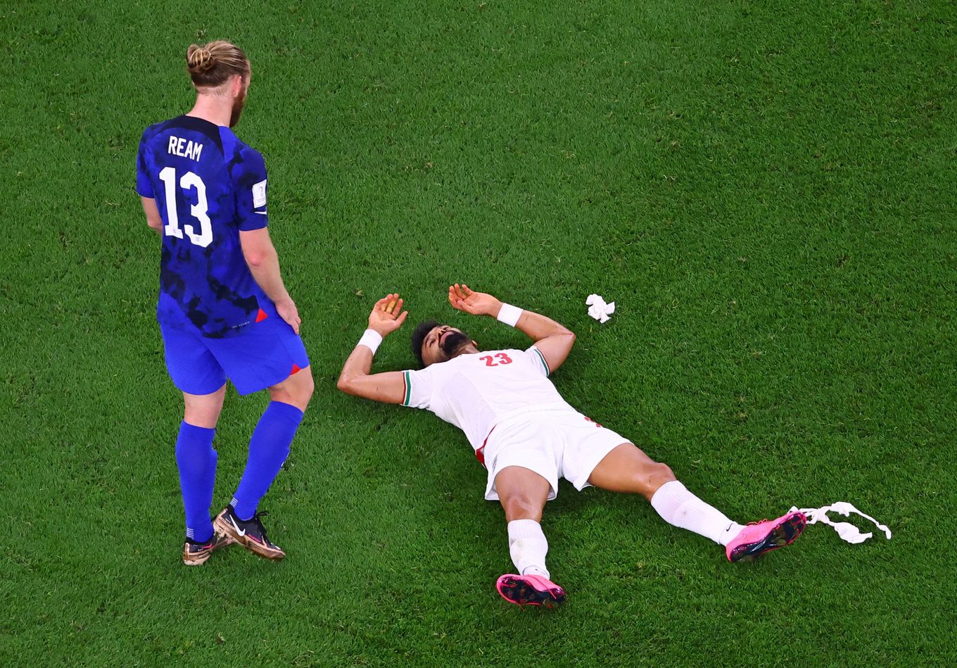 Ramin Rezaeian of Iran and Tim Ream of the United States at the World Cup. (Fabrizio Bensch/Reuters)