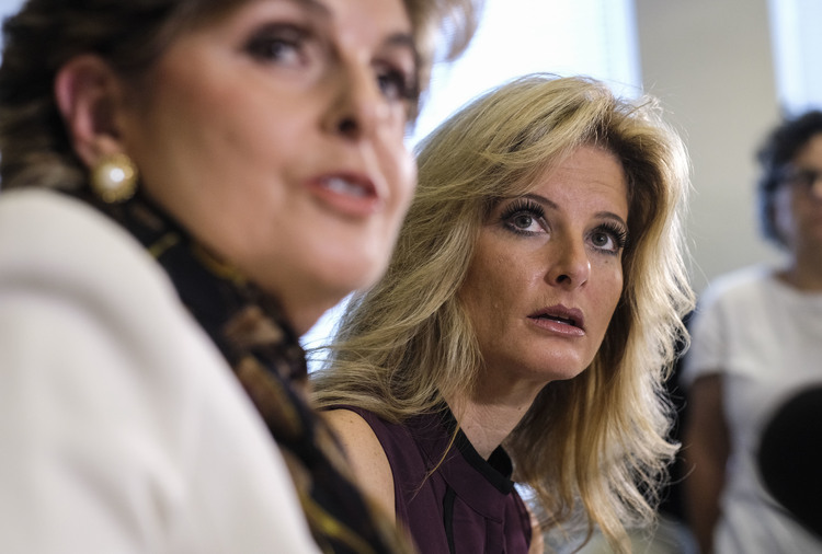 Summer Zervos, right, listens alongside her attorney Gloria Allred during a news conference in Los Angeles. (AP/Ringo H.W. Chiu)</p>