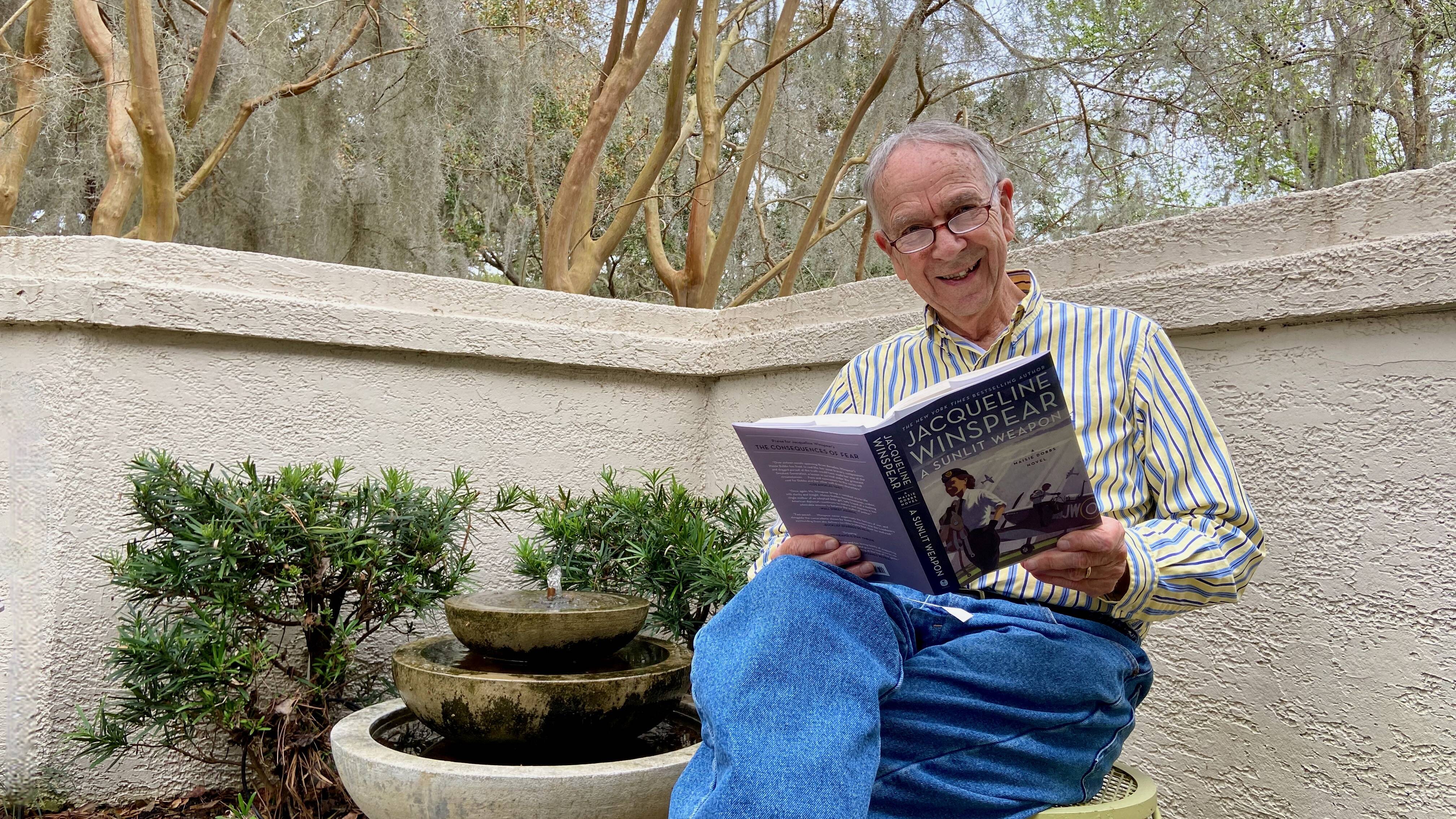 Don't bother my dad when he's reading a new Maisie Dobbs book by Jacqueline Winspear. (Ron Charles/The Washington Post)